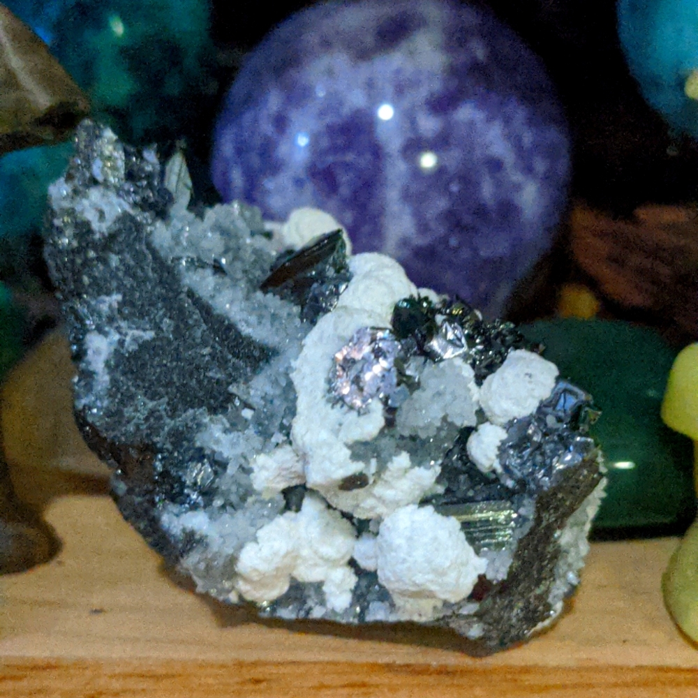 "Silver Penguin" silver pyrite on calcite